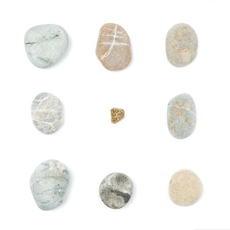Mix of rounded multicolor textured stones forming square shape. Isolated on white background flat layの写真素材