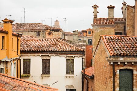 roofs of venetian ancient buildings in Venice, Italy.の写真素材