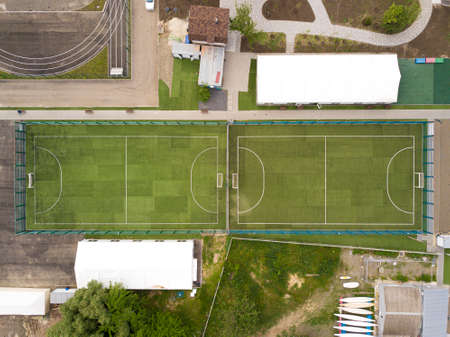 Aerial top down drone photo of green football pitch empty to be used for soccer game. Rostov-on-Don. Russia.の写真素材
