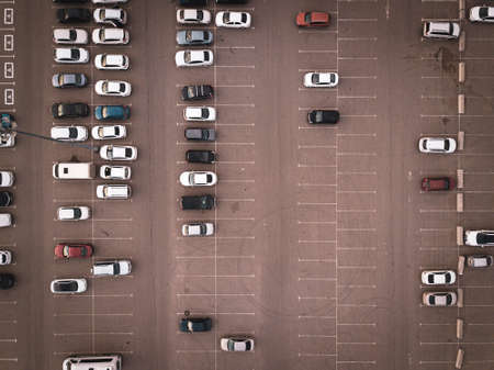 Open air big parking for residents of the area, top aerial view from high.の写真素材