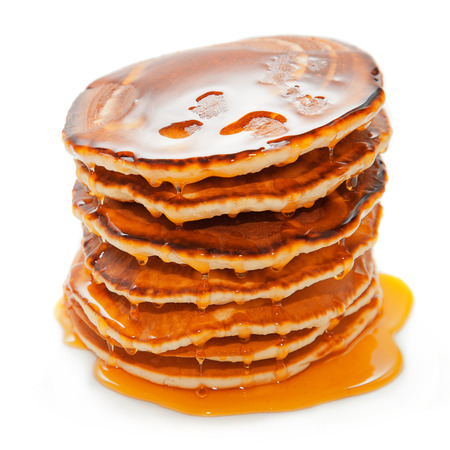 Pancakes with honey on white backgroundの写真素材