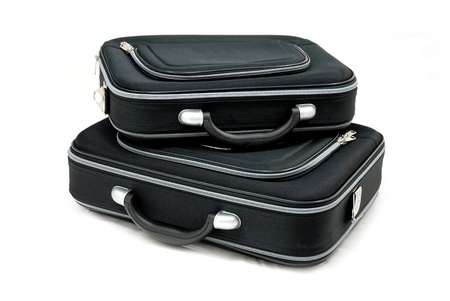 Two black suitcases - vacation baggage - isolated の写真素材