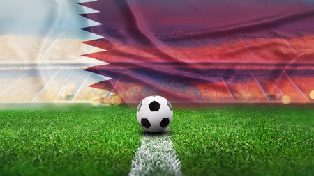 textured soccer game field with a soccer ball on the line in Qatar - center, midfieldの写真素材