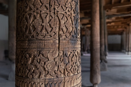 Carved wooden column in Juma masjid ancient mosque in old city of Ichan-Kala, Khiva, Uzbekistanの写真素材