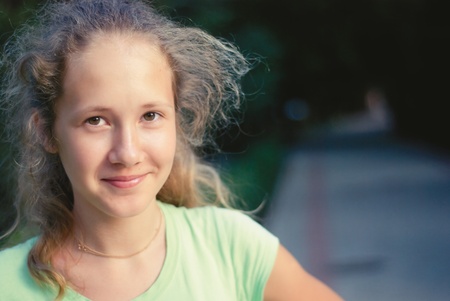 a young girl in parkの写真素材