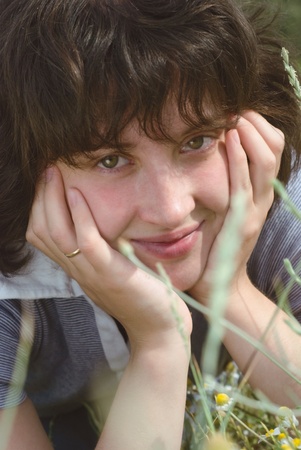 a young woman on the meadowの写真素材