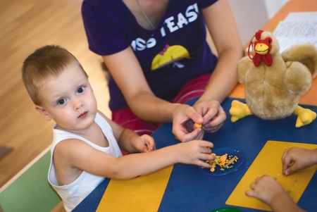 a little boy at the preschool classの写真素材
