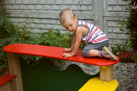 a little boy on playgroundの写真素材