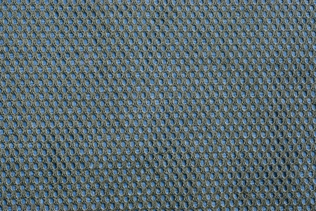 reticular tissue on blue denim backgroundの写真素材