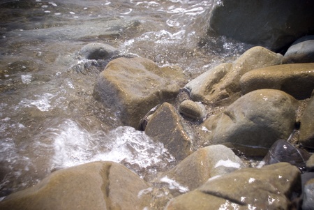 a stone lying on the beachの写真素材