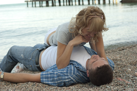 young couple at the beachの写真素材