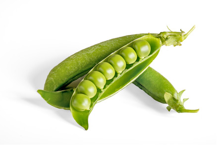 Fresh peas isolated on white background の写真素材