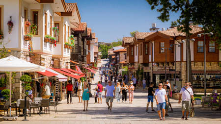 Liman cd. with walking people sunny day in Side, Turkeyの写真素材