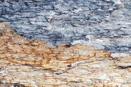 Detailed stone surface texture, blue and brown marble slabs with cracks, detailed structure of stone in natural patterned for background and design.の写真素材
