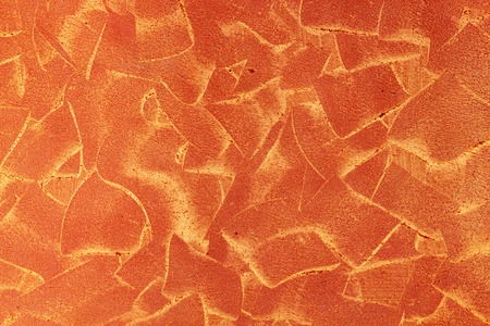 Yellow-red wall with texture strokesの写真素材
