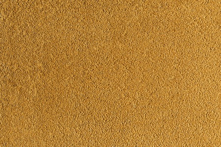 Yellow flaky texture wallsの写真素材
