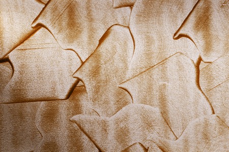 Abstract golden texture units on a white background