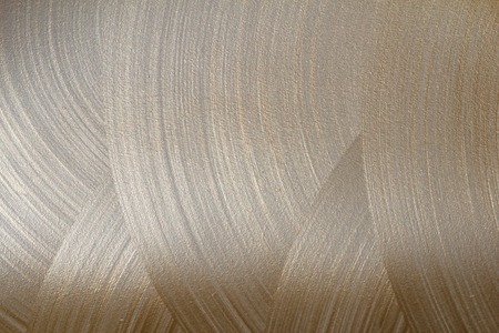 Golden-beige texture on white backgroundの写真素材