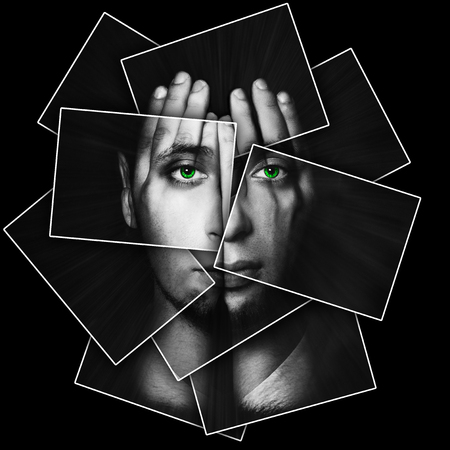 Face shines through hands, face is divided into many parts by cards , double exposureの写真素材
