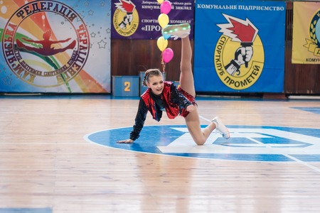Kamenskoye, Ukraine - March 8, 2017: Championship of the city of Kamenskoye in cheerleading among solos, duets and teams, young cheerleaders perform at the city cheerleading championshipのeditorial素材