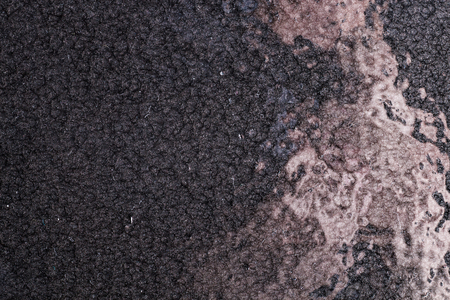 black hammered metal background,abstract metalic texture, sheet of metal surface painted with hammer paintの写真素材