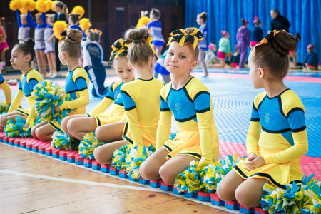 Kamenskoye, Ukraine - March 9, 2017: Championship of the city of Kamenskoye in cheerleading among solos, duets and teams, young cheerleaders perform at the city cheerleading championshipのeditorial素材