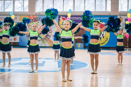 Kamenskoye, Ukraine - March 9, 2017: Championship of the city of Kamenskoye in cheerleading among solos, duets and teams, young cheerleaders perform at the city cheerleading championshipのeditorial素材