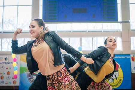 Kamenskoye, Ukraine - March 9, 2017: Championship of the city of Kamenskoye in cheerleading among solos, duets and teams, young cheerleaders perform at the city cheerleading championshipのeditorial素材