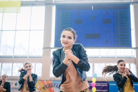 Kamenskoye, Ukraine - March 9, 2017: Championship of the city of Kamenskoye in cheerleading among solos, duets and teams, young cheerleaders perform at the city cheerleading championshipのeditorial素材