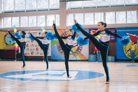Kamenskoye, Ukraine - March 9, 2017: Championship of the city of Kamenskoye in cheerleading among solos, duets and teams, young cheerleaders perform at the city cheerleading championshipのeditorial素材