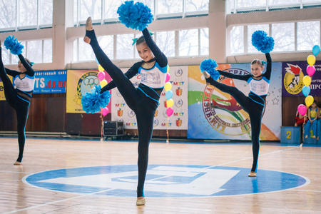Kamenskoye, Ukraine - March 9, 2017: Championship of the city of Kamenskoye in cheerleading among solos, duets and teams, young cheerleaders perform at the city cheerleading championshipのeditorial素材