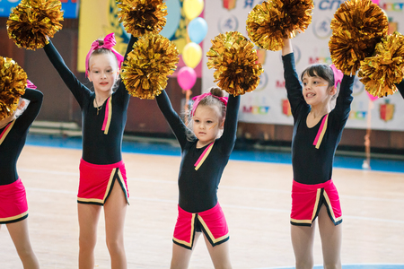Kamenskoye, Ukraine - March 9, 2017: Championship of the city of Kamenskoye in cheerleading among solos, duets and teams, young cheerleaders perform at the city cheerleading championshipのeditorial素材