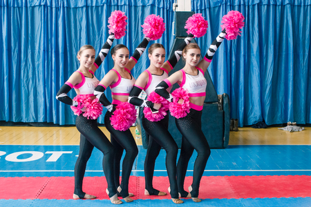 Kamenskoye, Ukraine - March 9, 2017: Championship of the city of Kamenskoye in cheerleading among solos, duets and teams, young cheerleaders perform at the city cheerleading championshipのeditorial素材