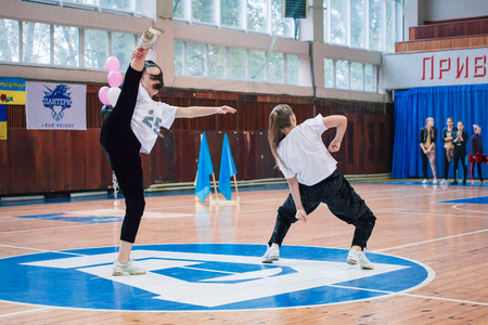 Kamenskoye, Ukraine - November 28, 2017: Championship of the city of Kamenskoye in cheerleading among solos, duets and teams, young cheerleaders perform at the city cheerleading championshipのeditorial素材