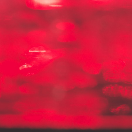abstract red texture,red light bokeh backgroundの写真素材