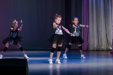 Kamenskoye, Ukraine - November 14, 2018: Championship of the city of Kamenskoye in cheerleading among duets and teams, young cheerleaders perform at the city cheerleading championshipのeditorial素材