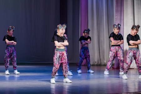 Kamenskoye, Ukraine - November 14, 2018: Championship of the city of Kamenskoye in cheerleading among duets and teams, young cheerleaders perform at the city cheerleading championshipのeditorial素材