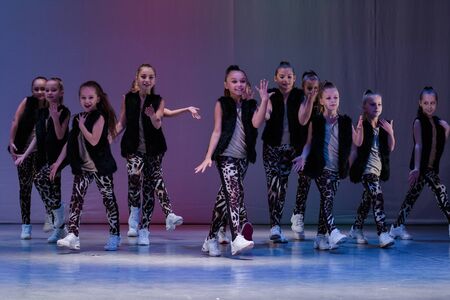 Kamenskoye, Ukraine - October 14, 2018: Championship of the city of Kamenskoye in cheerleading among duets and teams, young cheerleaders perform at the city cheerleading championshipのeditorial素材