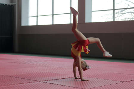 Kamianske, Ukraine - February 16, 2020: Cup of Dnipropetrovsk region from cheerleading among solo, duets and teams, young cheerleaders perform at the city cheerleading championshipのeditorial素材