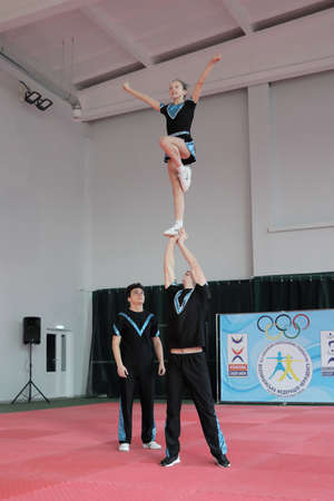 Kamianske, Ukraine - February 16, 2020: Cup of Dnipropetrovsk region from cheerleading among solo, duets and teams, young cheerleaders perform at the city cheerleading championshipのeditorial素材