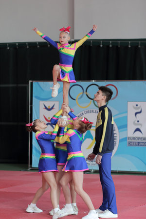 Kamianske, Ukraine - February 16, 2020: Cup of Dnipropetrovsk region from cheerleading among solo, duets and teams, young cheerleaders perform at the city cheerleading championshipのeditorial素材