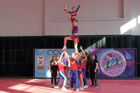 Kamianske, Ukraine - February 16, 2020: Cup of Dnipropetrovsk region from cheerleading among solo, duets and teams, young cheerleaders perform at the city cheerleading championshipのeditorial素材