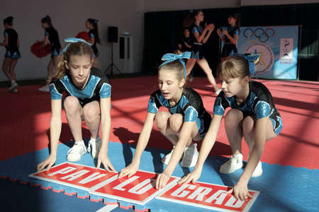 Kamianske, Ukraine - February 16, 2020: Cup of Dnipropetrovsk region from cheerleading among solo, duets and teams, young cheerleaders perform at the city cheerleading championshipのeditorial素材