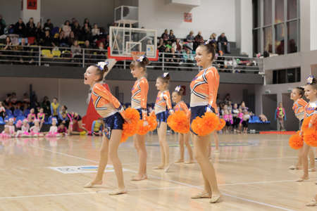 Kamianske, Ukraine - February 16, 2020: Cup of Dnipropetrovsk region from cheerleading among solo, duets and teams, young cheerleaders perform at the city cheerleading championshipのeditorial素材
