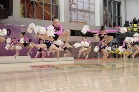 Kamianske, Ukraine - February 16, 2020: Cup of Dnipropetrovsk region from cheerleading among solo, duets and teams, young cheerleaders perform at the city cheerleading championshipのeditorial素材