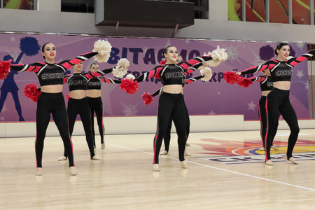 Kamianske, Ukraine - February 16, 2020: Cup of Dnipropetrovsk region from cheerleading among solo, duets and teams, young cheerleaders perform at the city cheerleading championshipのeditorial素材