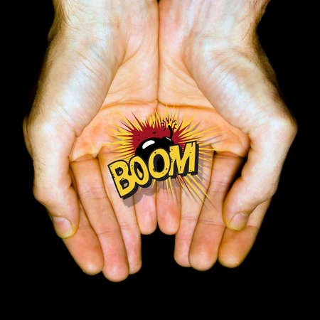 Bomb in hands の写真素材