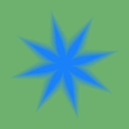 Blurred blue eight-pointed star on green backgroundの写真素材