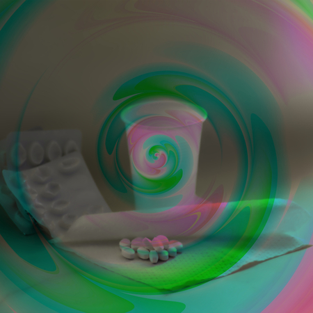 Tablets with the crucible covered with pink-and-green spiralの写真素材