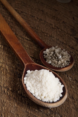 Sea salt in wooden spoonsの写真素材